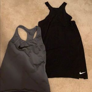 Two Nike tank tops